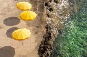 photos de la plage privée du Provençal Hotel